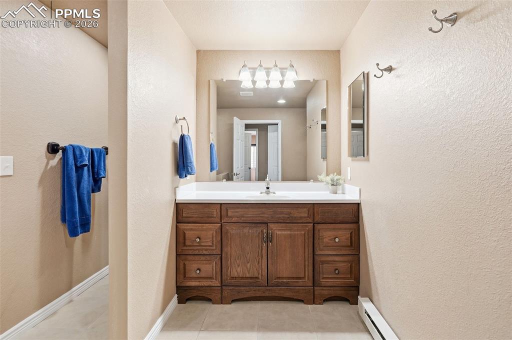 Image 28 of 36: Large basement secondary bedroom