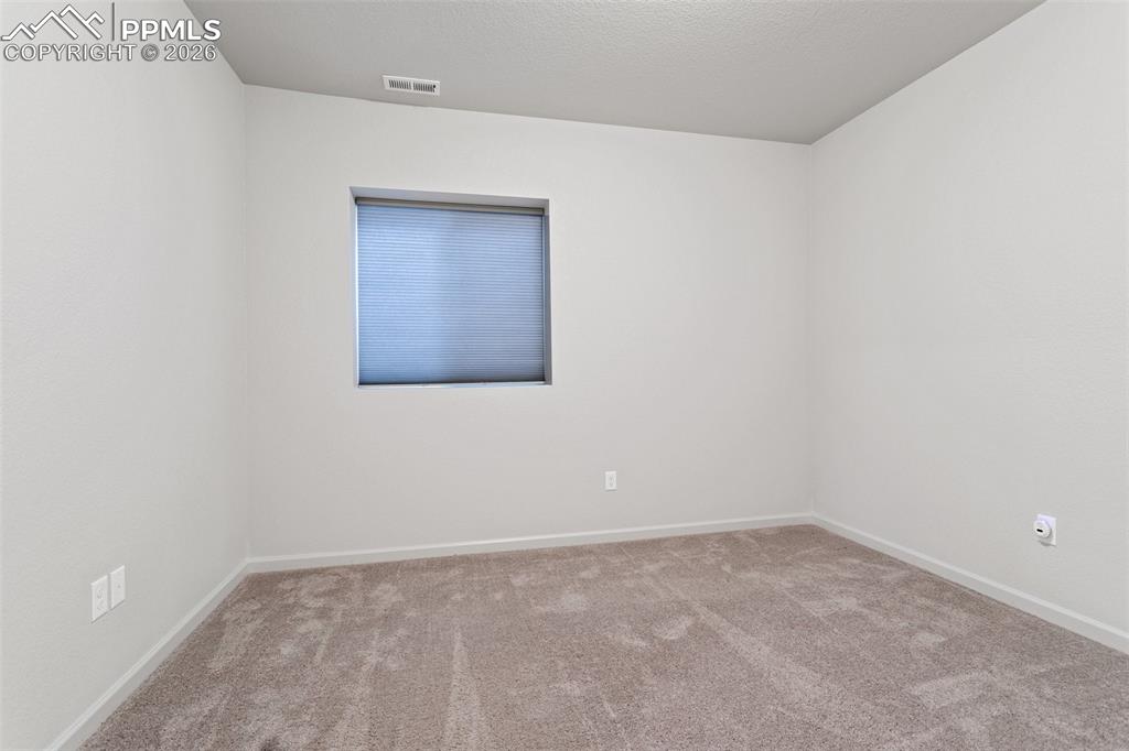 Image 32 of 35: Bedroom