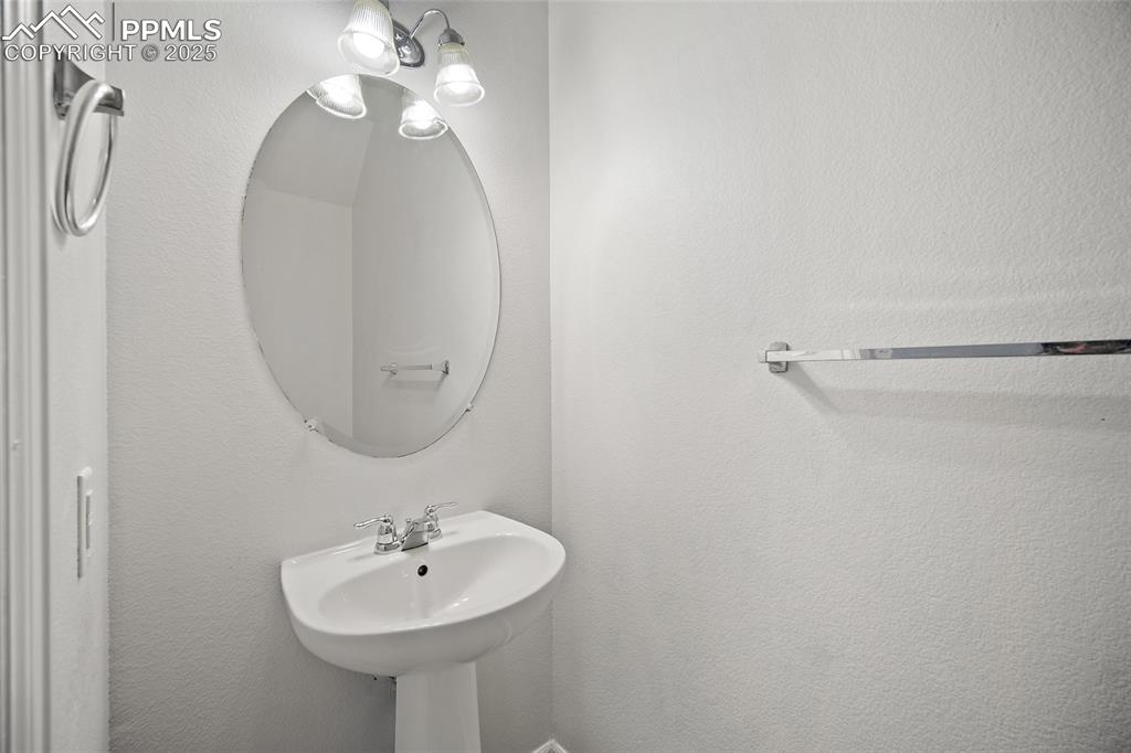 Image 17 of 33: Powder room on main level. 