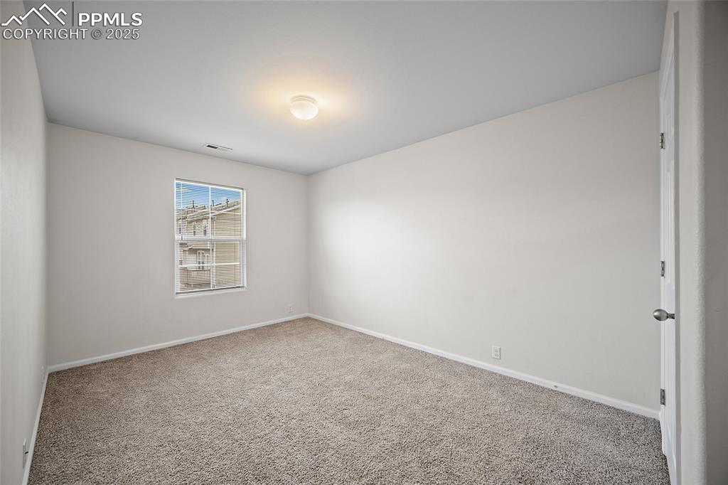 Image 27 of 33: Bedroom