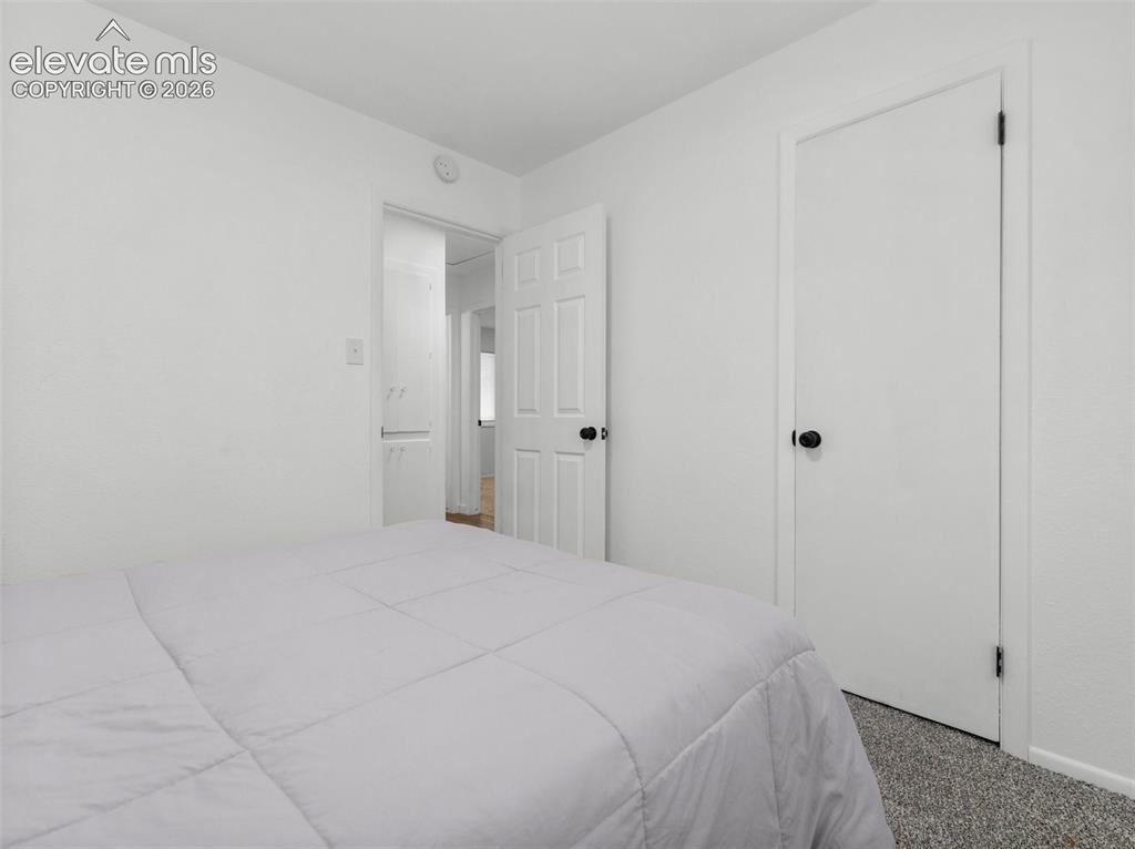 Image 13 of 21: Bedroom
