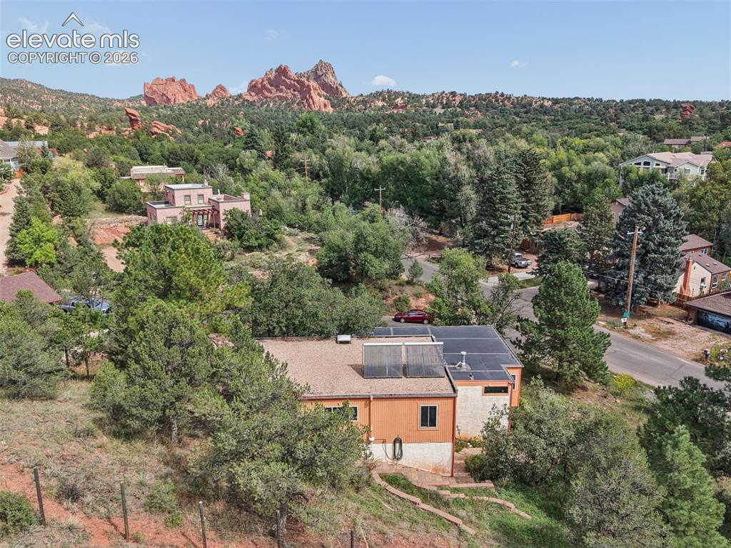 Image 3 of 41: Garden of the Gods trail system is a 2-minute walk from this home.