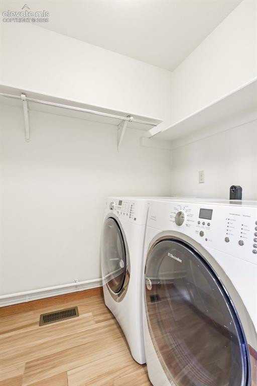 Image 30 of 41: Laundry is off the kitchen.