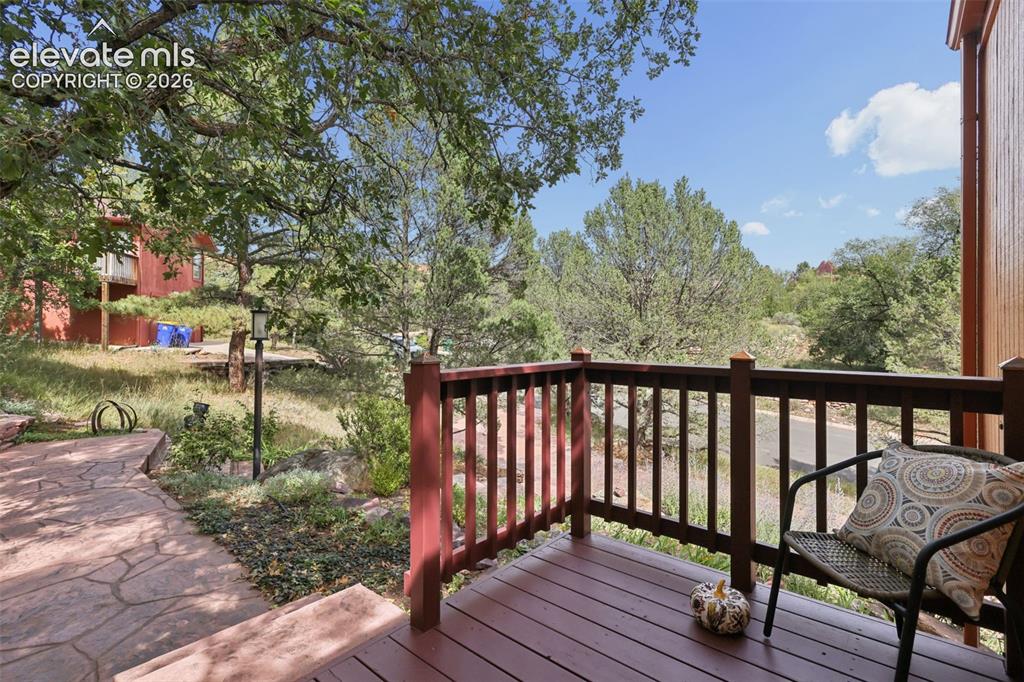 Image 5 of 41: Relax on the front deck with a cup of coffee!