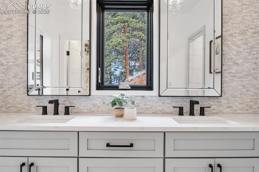 Image 16 of 30: Treed views from bathroom