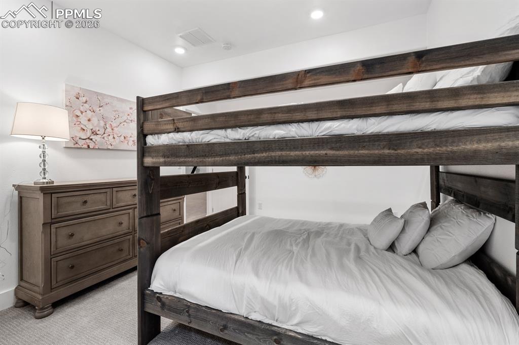 Image 26 of 30: Additional basement bedroom