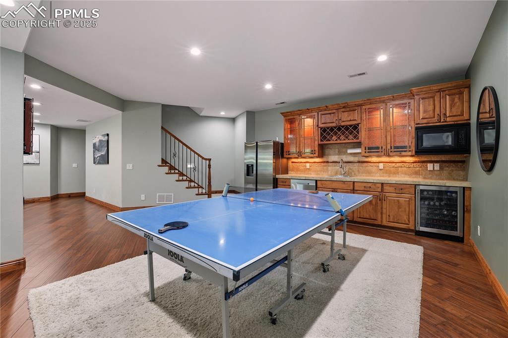 Image 31 of 47: Walk-Out Basement Bar, Family Room / Rec Room