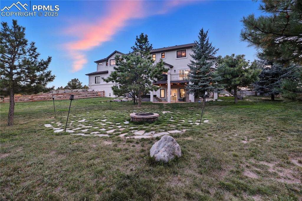 Image 44 of 47: Fire Pit and Large Fenced Backyard