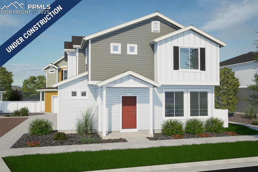 Caption: View of front of home featuring board and batten siding