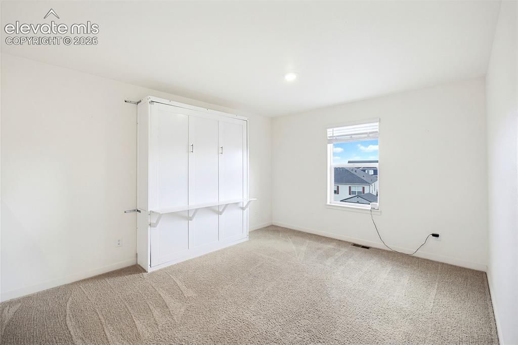 Image 16 of 37: Loft with queen Murphy bed