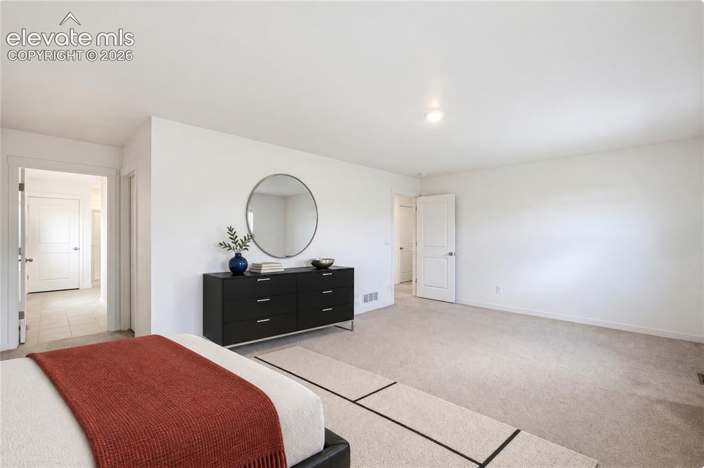 Image 41 of 50: Master Bedroom