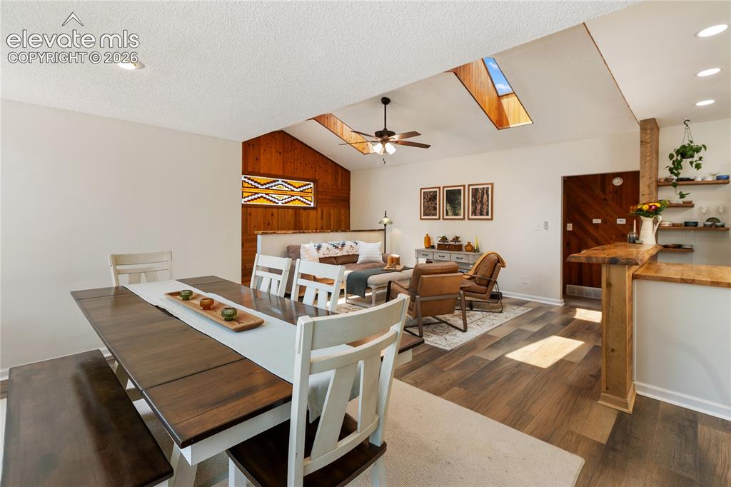 Image 12 of 27: Open concept dining, living and kitchen!