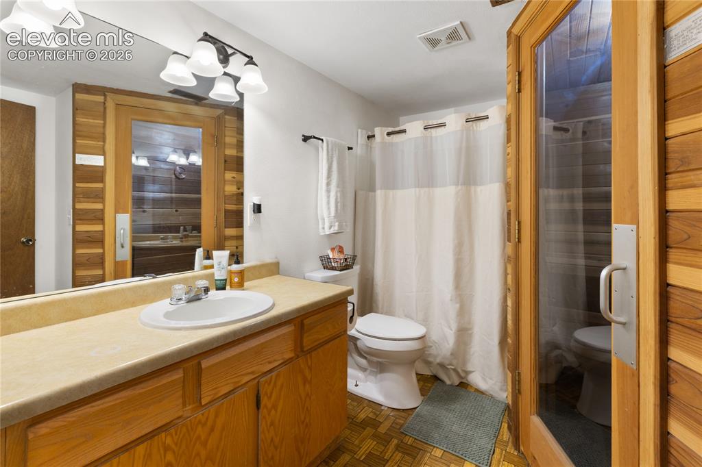 Image 20 of 27: The lower level also has a big, full bathroom and a...wait for it....sauna!