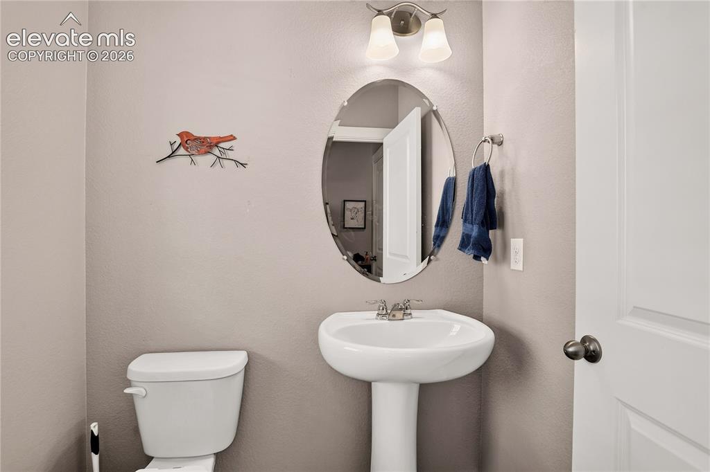 Image 10 of 20: Main level powder room