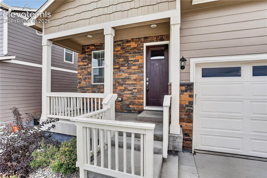 Image 2 of 20: Covered front porch