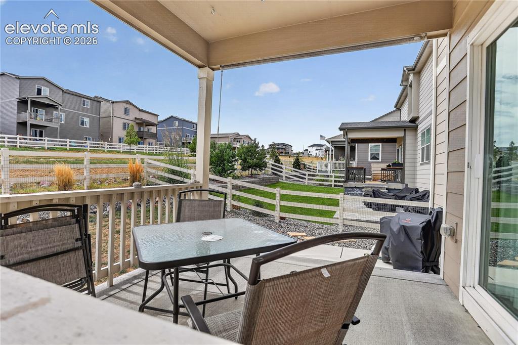 Image 6 of 20: Covered back porch