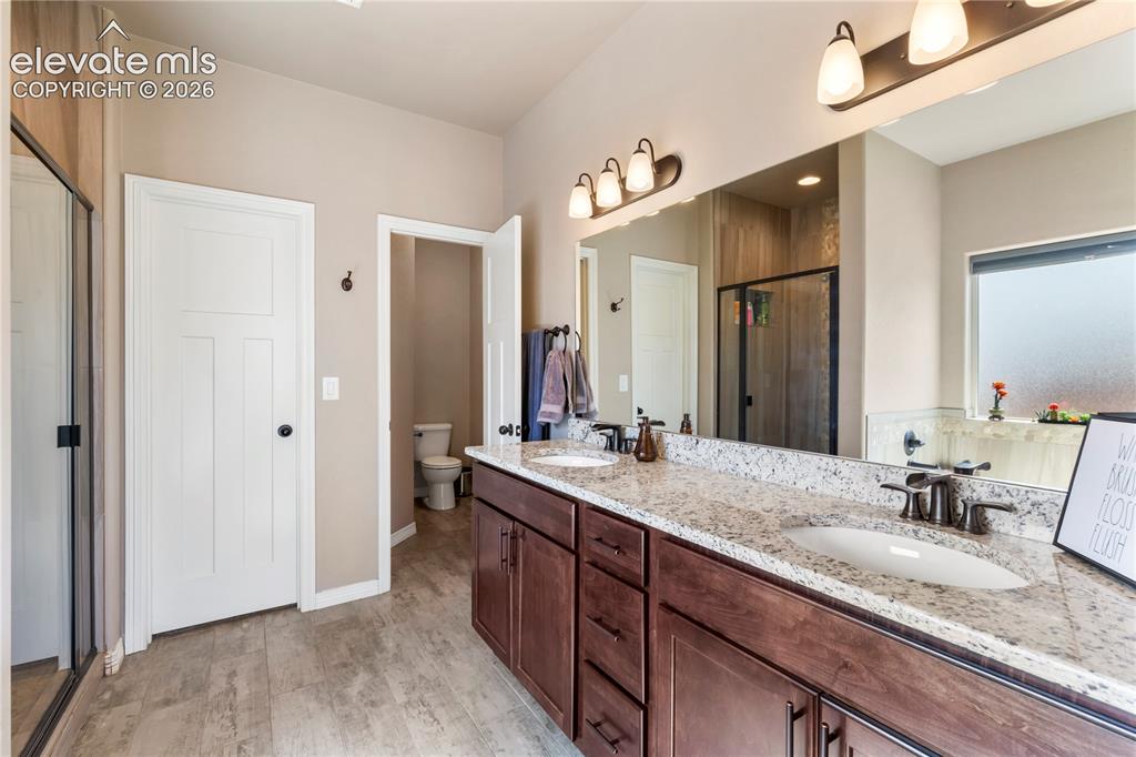 Image 12 of 20: Tons of counter space in the 3/4 primary bath