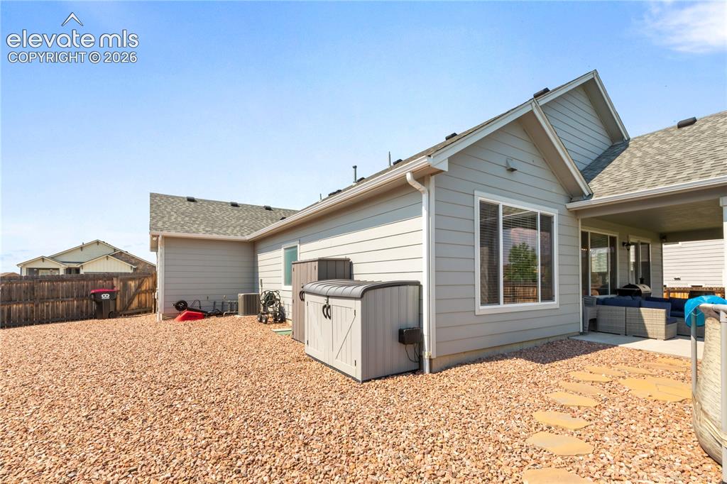 Image 19 of 20: Fully landscaped back yard