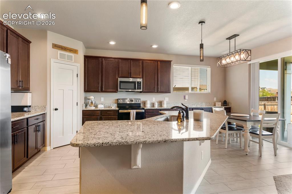 Image 5 of 20: Huge pantry in kitchen