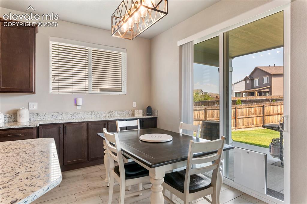 Image 7 of 20: Nice size eat in kitchen