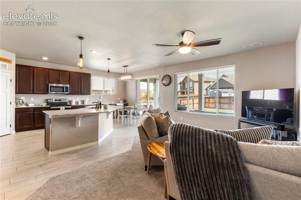 Image 9 of 20: Open room concept with 9
