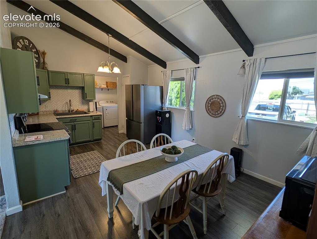 Image 5 of 15: Kitchen and Dining area