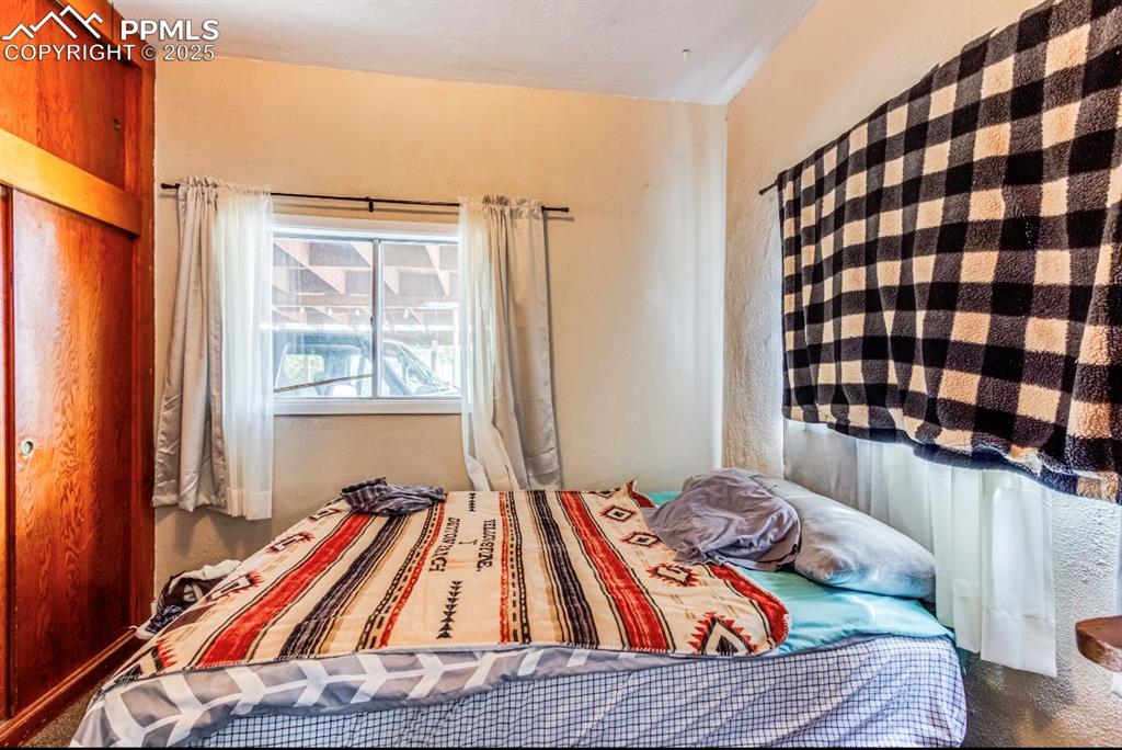 Image 12 of 23: Bedroom