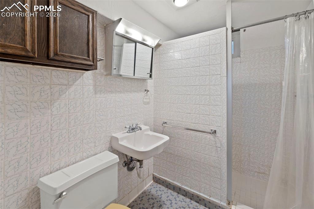 Image 34 of 49: 3/4 bath basement