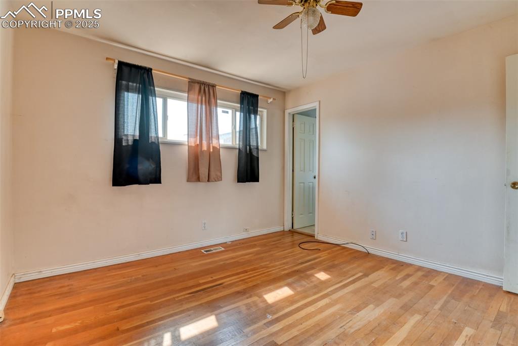 Image 28 of 44: Real hardwood floors in all 3 bedrooms