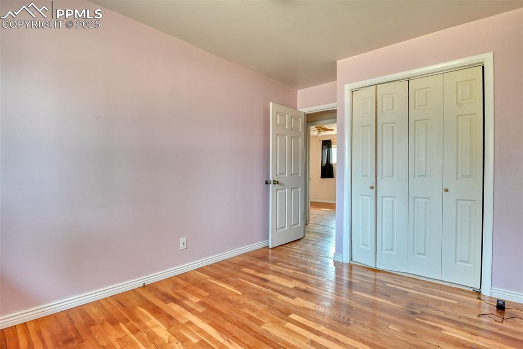 Image 32 of 44: Real hardwood flooring in all 3 bedrooms