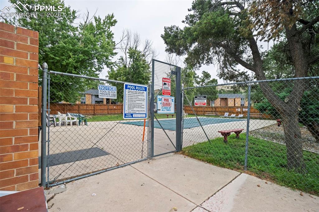 Image 22 of 25: Nice deck around the seasonal pool.