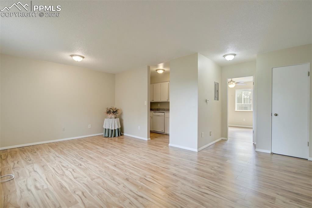 Image 4 of 25: Cozy dining area adjacent to kitchen.