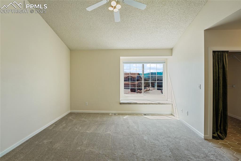 Image 13 of 45: Master Bedroom. Vaulted Ceilings. Mountain Views. Master Bathroom adjoins