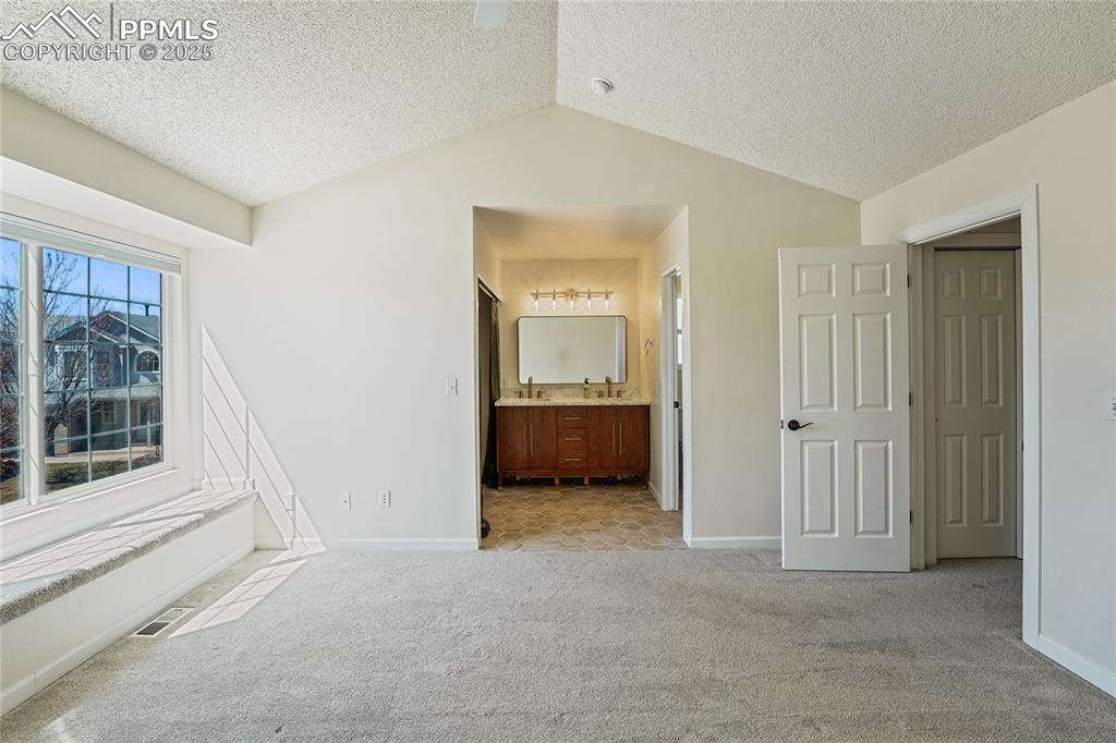 Image 14 of 45: Vaulted Ceilings in Master Bedroom