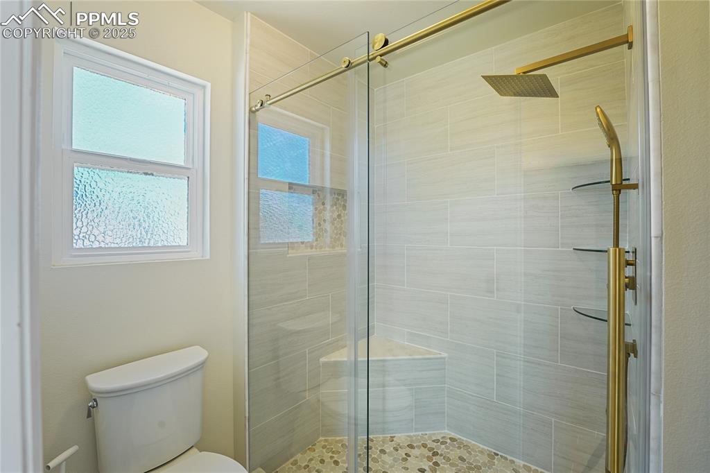 Image 16 of 45: Master Bathroom with shower