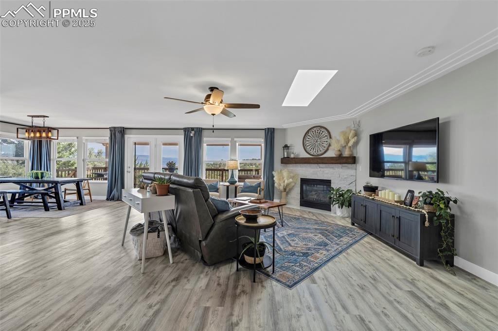 Image 2 of 50: From the entry, a spacious and open design.