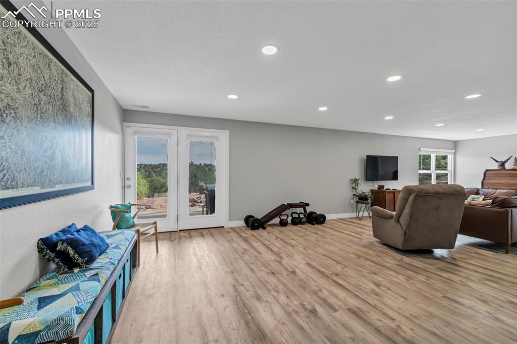 Image 23 of 50: The full finished walkout basement offers so many possibilities, with a lar