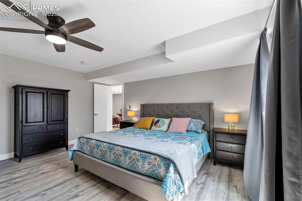 Image 28 of 50: The 5th bedroom is very large and features a huge walk in closet.
