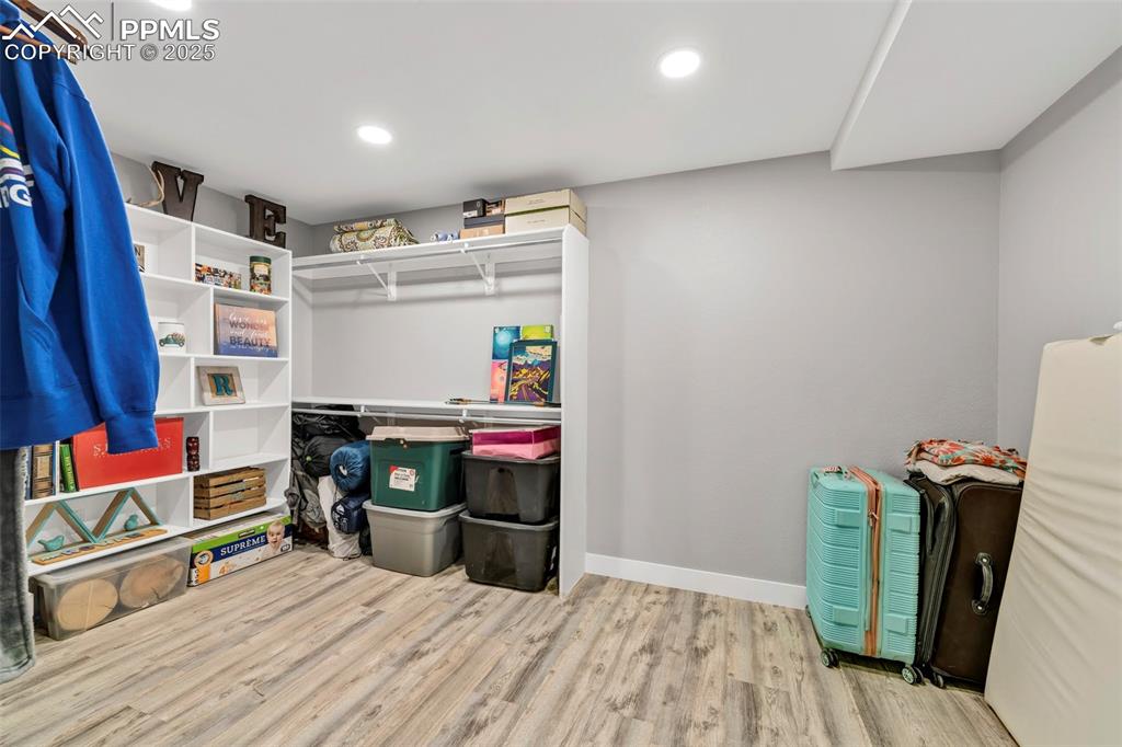 Image 29 of 50: The closet with two built-in shelving units is great for organizing seasona