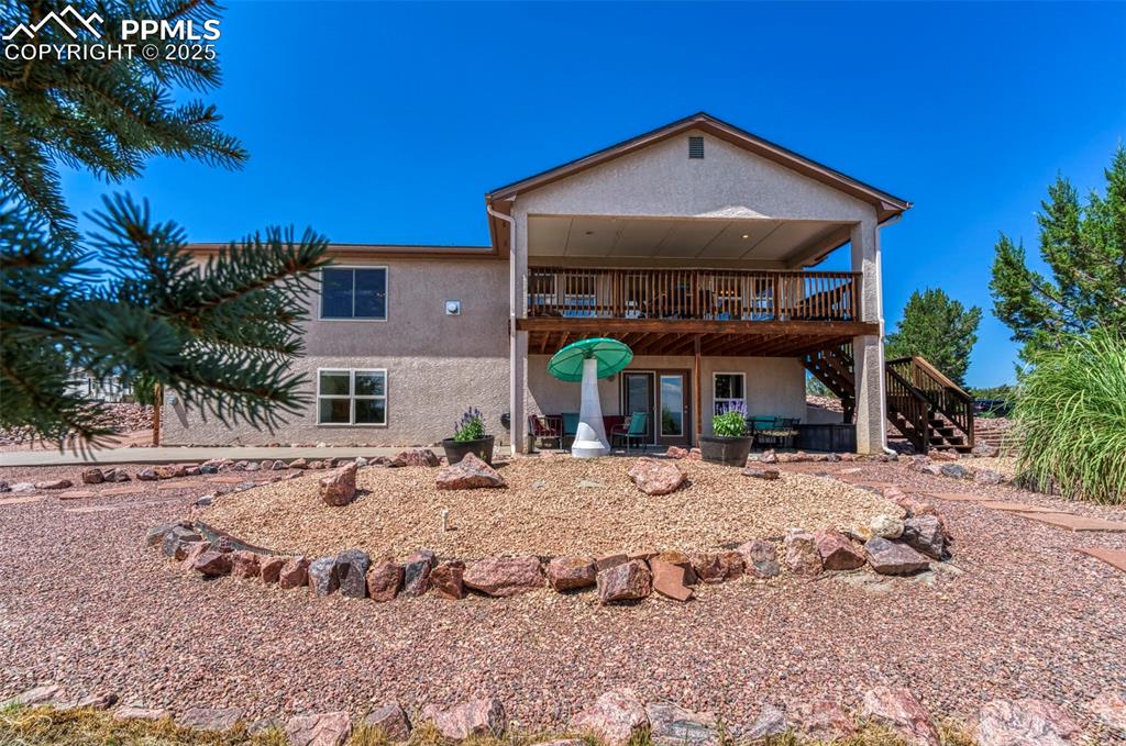 Image 32 of 50: Extensive xeriscaping around the home provides a beautiful setting with ver