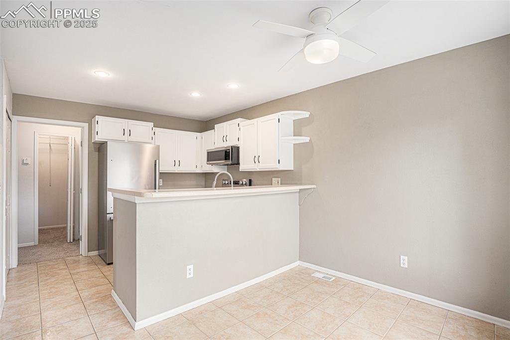 Image 10 of 26: kitchen with Dining area