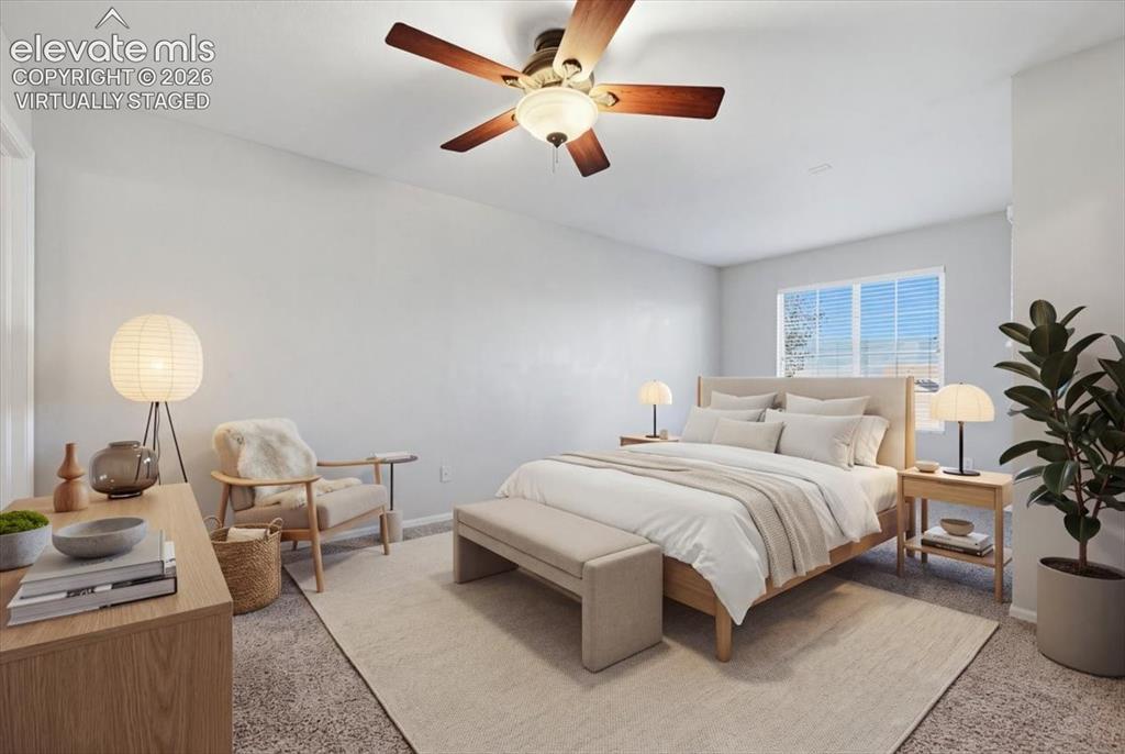 Image 21 of 44: primary bedroom with private balcony. Virtually staged