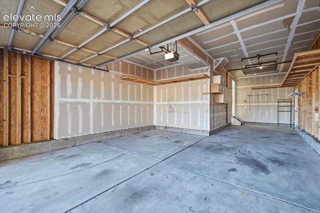 Image 39 of 44: 3 car tandem garage