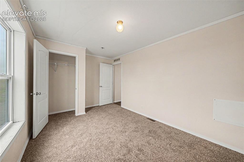 Image 8 of 15: Bedroom