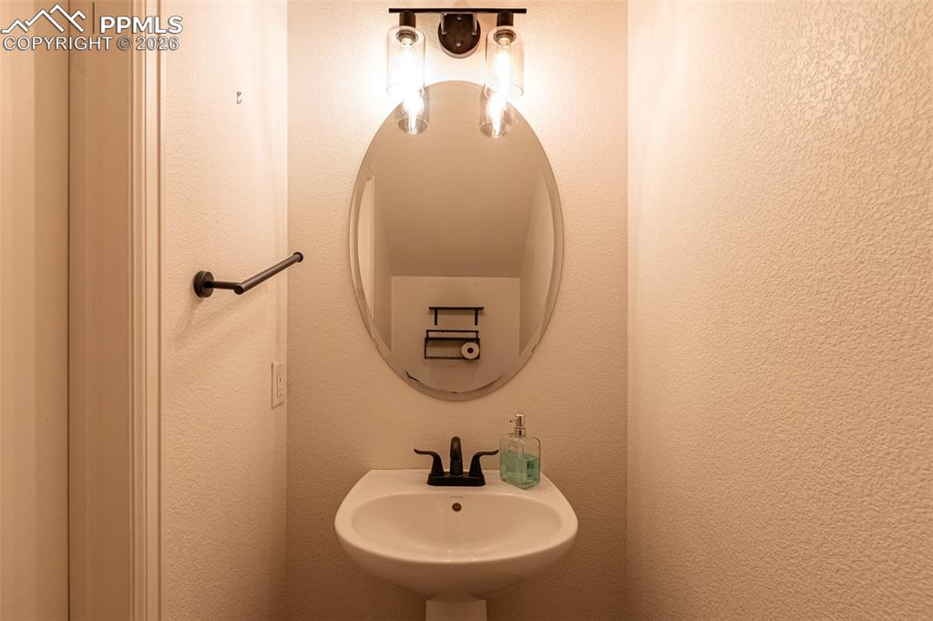 Image 16 of 34: Bathroom featuring a sink