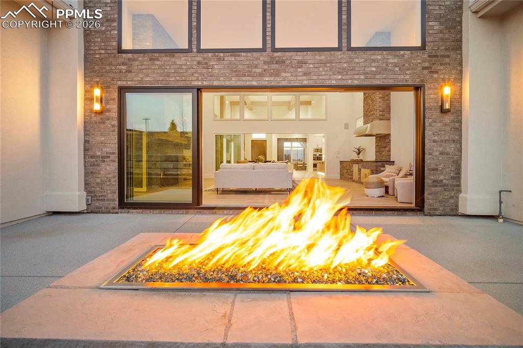 Image 40 of 43: Stunning view from the backyard that sees through all the way to the mounta