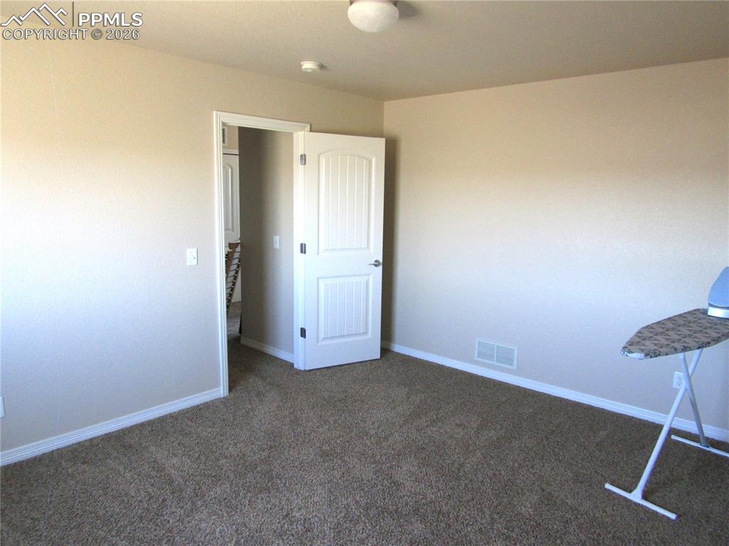 Image 21 of 29: Bedroom