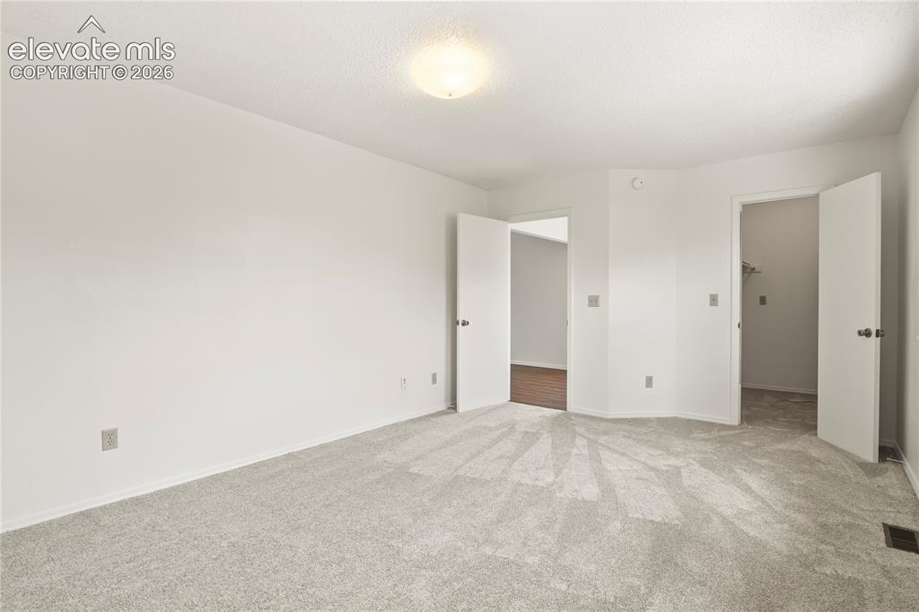 Image 13 of 33: Master Bedroom