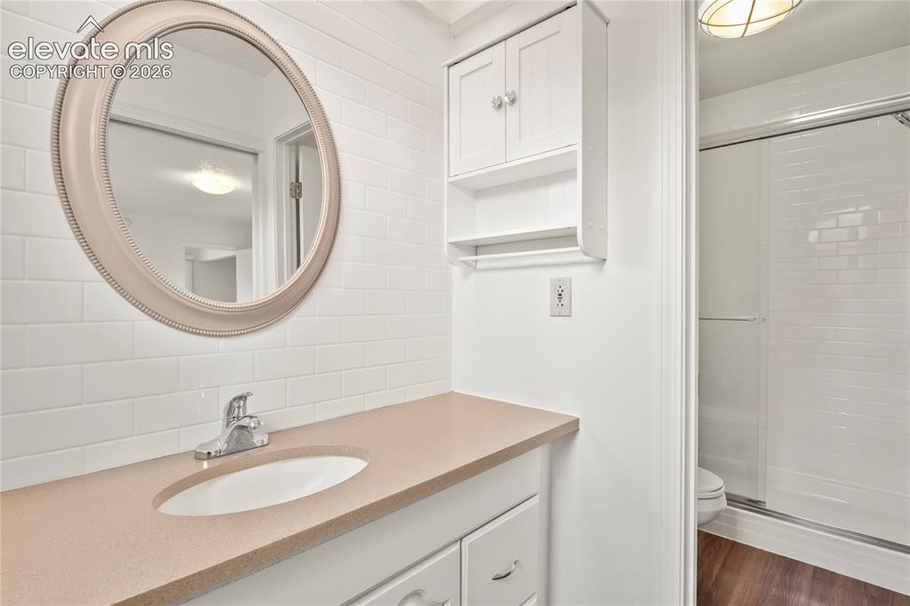 Image 14 of 33: Main level primary bathroom