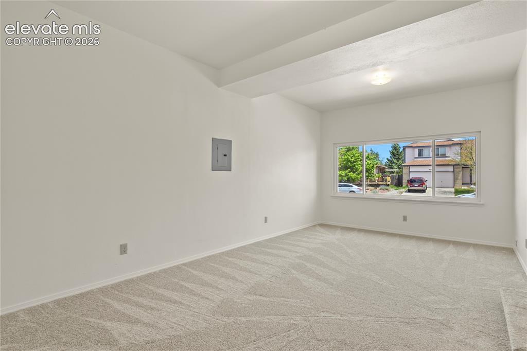Image 16 of 33: Additional family room that provides flexible secondary living space